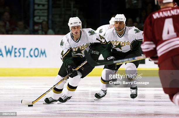 Stu Barnes of the Dallas Stars controls the puck against the Phoenix Coyotes December 10, 2003 at America West Arena in Phoenix, Arizona. The Coyotes...