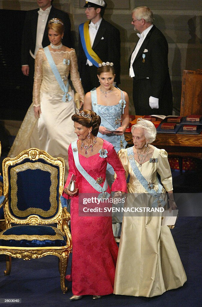Sweden's Queen Silvia holds Princess Lil