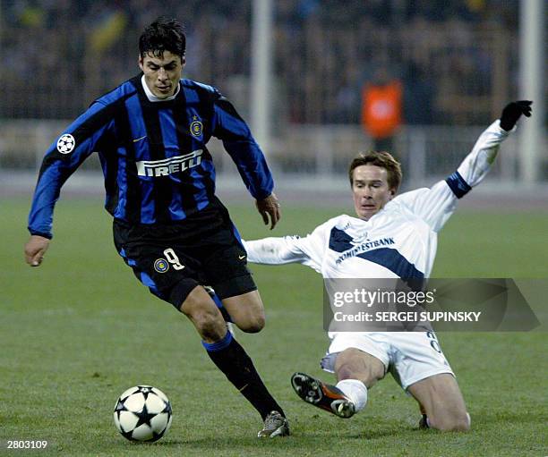 Belkevich Valentin , player of FC Dynamo Kyiv fights for a ball against Cruz Julio Ricardo of FC Internazionale during their UEFA Champion's League...