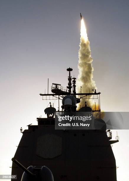 Seen in this U.S. Navy handout a Standard Missile-3 is launched from the Aegis cruiser USS Lake Erie as part of the Missile Defense Agency's latest...