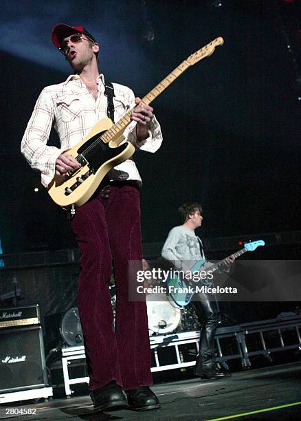 Matchbox Twenty Lead guitar player Kyle Cook performs onstage at the Z100 Jingle Ball 2003 on December 11, 2003 at Madison Square Garden, in New York...