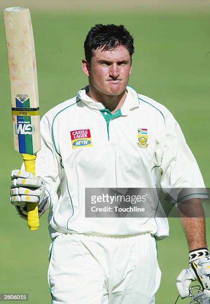 Graeme Smith of South Africa acknowledges the crowd as he leaves the field at the end of play during the First Test between South Africa and West...