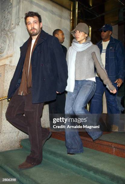 Actor Ben Affleck and actress/singer Jennifer Lopez exiting a midtown hotel on their way to do some holiday shopping December 12, 2003 in New York...