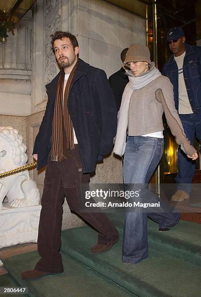 Actor Ben Affleck and actress/singer Jennifer Lopez exiting a midtown hotel on their way to do some holiday shopping December 12, 2003 in New York...