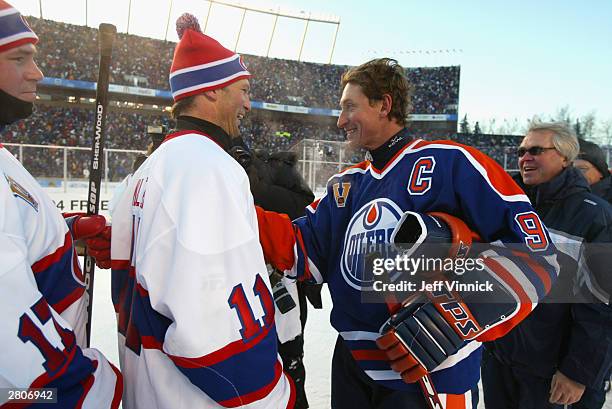 Kirk Muller of the Montreal Canadiens and Wayne Gretzky of the Edmonton Oilers shake hands after the Molson Canadien Heritage Classic Megastars Game...