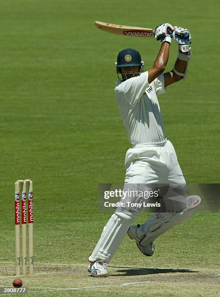 Rahul Dravid drives Stuart Macgill during the 2nd Test between Australia and India at the Adelaide Oval on December 13, 2003 in Adelaide, Australia.