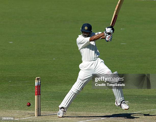 Rahul Dravid of India drives Andy Bichel of Australia on his way to 199 not out during the 2nd Test Match between Australia and India at the Adelaide...
