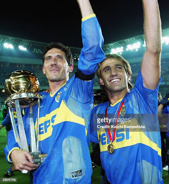 Diego Cagna of Boca Juniors celebrates the victory of the European-South American Cup club soccer championship at the Yokohama International stadium...