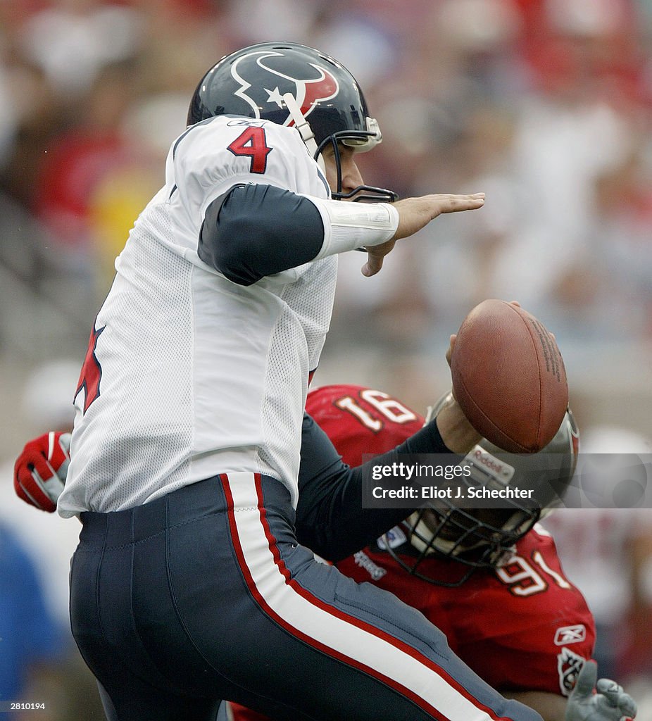 Quarterback Dave Ragone of the Houston Texans is sacked by defensive ...