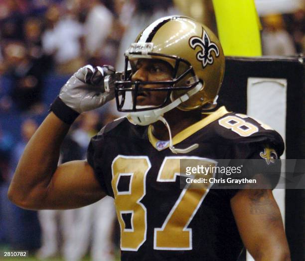 Joe Horn of The New Orleans Saints talks on his cell phone after scoring a touchdown against the New York Giants December 14 at the Superdome in New...