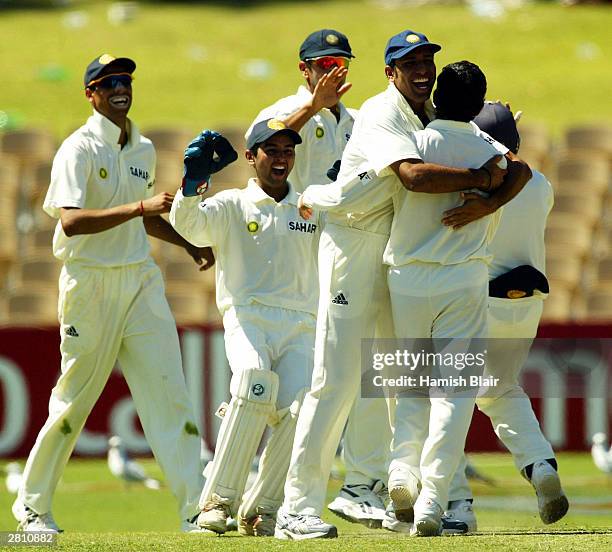 The Indian team celebrates during the fourth day of the 2nd Test between Australia and India at the Adelaide Oval on December 15, 2003 in Adelaide,...