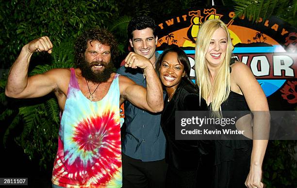 Cast members Rupert Boneham, Burton Roberts, Tijuana Bradley and Christa Hastie arrive at the season finale of "Survivor-Pearl Islands" on December...