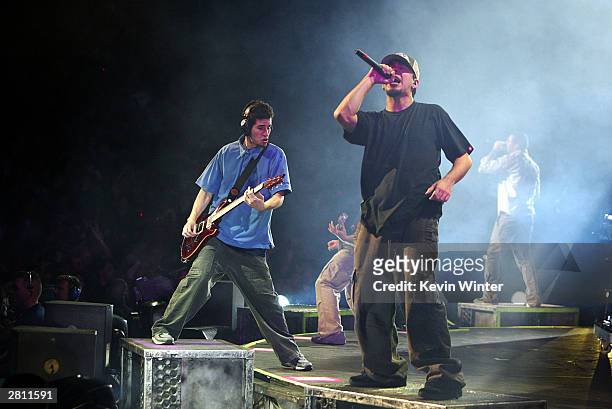 Linkin Park perform at KROQ's 2003 Almost Acoustic Christmas at the Universal Amphitheatre on December 14, 2003 in Los Angeles, California.