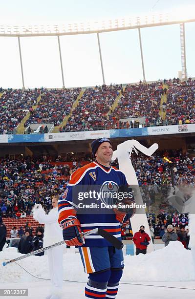 Glenn Anderson of the Edmonton Oilers acknowledges the fans as he skates into the rink to take on the Montreal Canadiens during the Molson Canadien...