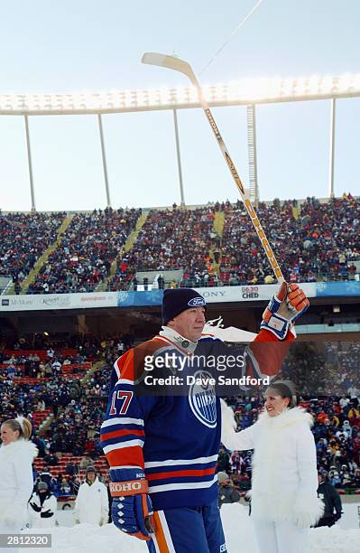Forward Jari Kurri of the Edmonton Oilers acknowledges the fans as he skates into the rink to take on the Montreal Canadiens during the Molson...