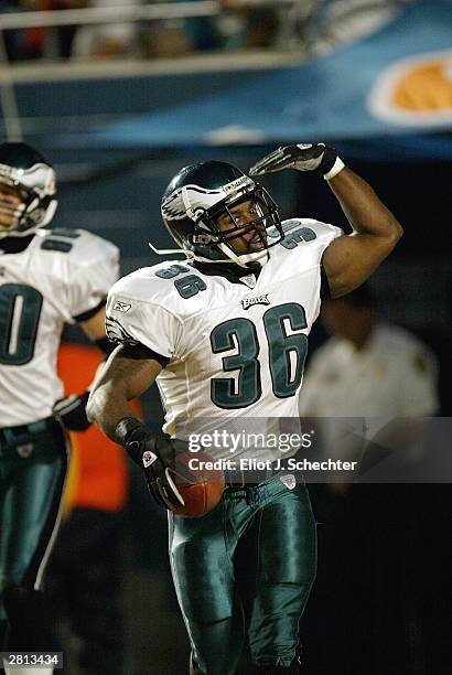 Running back Brian Westbrook of the Philadelphia Eagles salutes after scoring a touchdown against the Miami Dolphins December 15, 2003 at Pro Player...