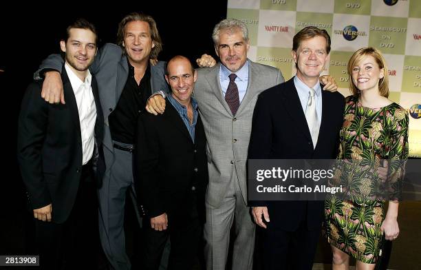 Actors Tobey Maguire, Jeff Bridges, Gary Stevens, writer/director Gary Ross, William H. Macy, and Elizabeth Banks pose for a photo as they arrive for...
