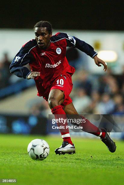 Jay Jay Okocha of Bolton Wanderers running with the ball during the FA Barclaycard Premiership match between Fulham and Bolton Wanderers on December...