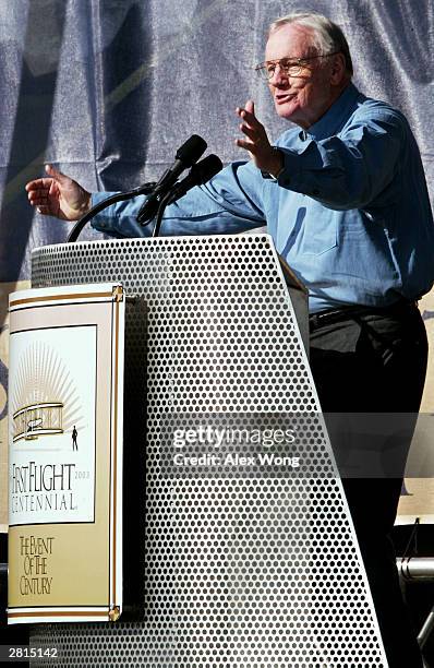 Former astronaut Neil Armstrong speaks during a presentation honoring 100 aviation heroes at the Wright Brothers Memorial December 16, 2003 in Kill...