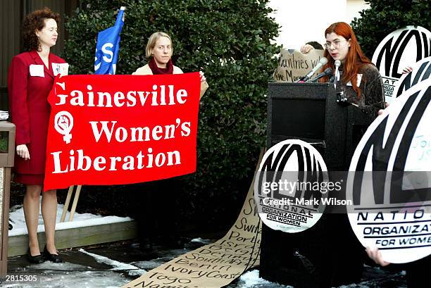 Kelly Mangan from Gainsville, Florida reads a statement in favor of the "morning after" pill outside of a Food and Drug Administration hearing...