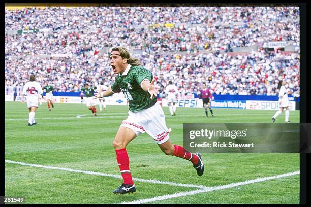 Luis Hernandez of Mexico celebrates after scoring a goal during a playoff game against the USA at Foxboro Stadium in Foxboro, Massachusetts. The...