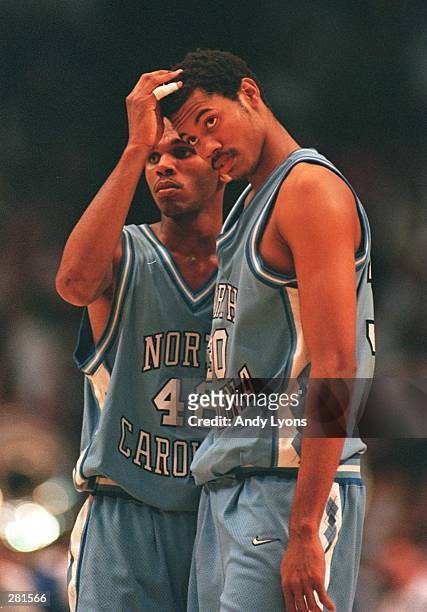 JERRY STACKHOUSE RUBS THE HEAD OF RASHEED WALLACE BOTH OF NORTH CAROLINA DURING THE FINAL MINUTE OF THE SOUTHEAST REGIONAL FINAL AGAINST KENTUCKY AT...