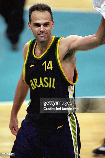 Oscar Schmidt of Brazil celebrates after play against Puerto Rico during the 1996 Summer Olympic Games on July 20, 1996 in Atlanta, Georgia. Brazil...
