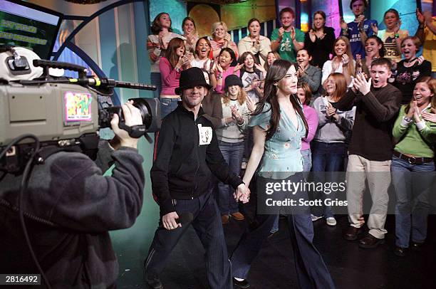 Dominic Monaghan and Liv Tyler appear on stage during MTV's Total Request Live at the MTV Times Square Studios December 16, 2003 in New York City.