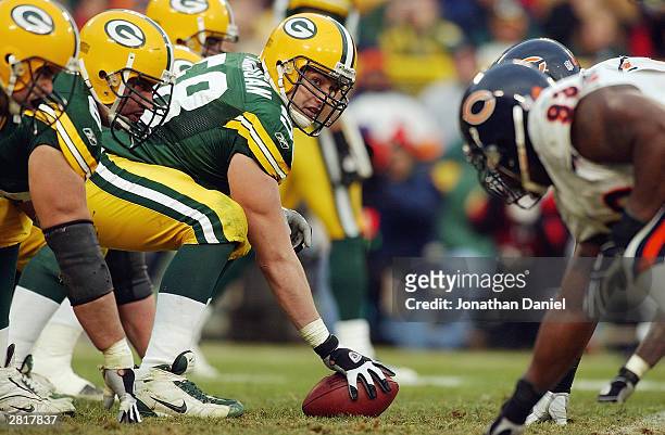 Mike Flanagan of the Green Bay Packers readies to snap the ball against the Chicago Bears during the game on December 7, 2003 at Lambeau Field in...