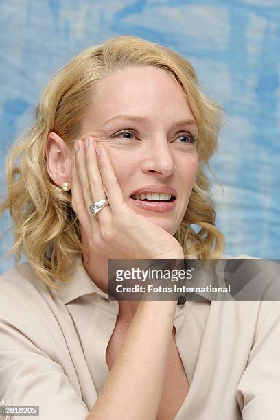 Actress Uma Thurman answers questions from the press at a junket for her new film "Pay Check" at the Regent Beverly Wilshire Hotel on December4, 2003...