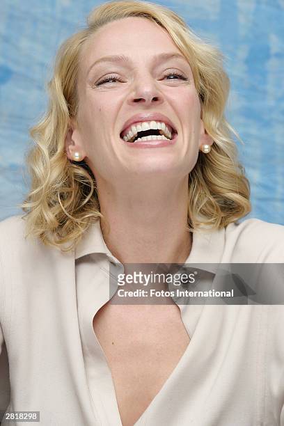 Actress Uma Thurman answers questions from the press at a junket for her new film "Pay Check" at the Regent Beverly Wilshire Hotel on December4, 2003...