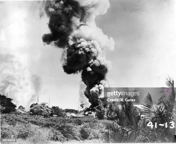 Bombs explode in air attacks in Manila after the attack on Pearl Harbor during World War II, circa 1940s.