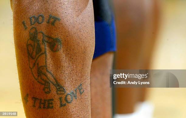 Tatoo on the leg of Al Harrington of the Indiana Pacers is pictured during a game against the Orlando Magic on December 17, 2003 at Conseco...