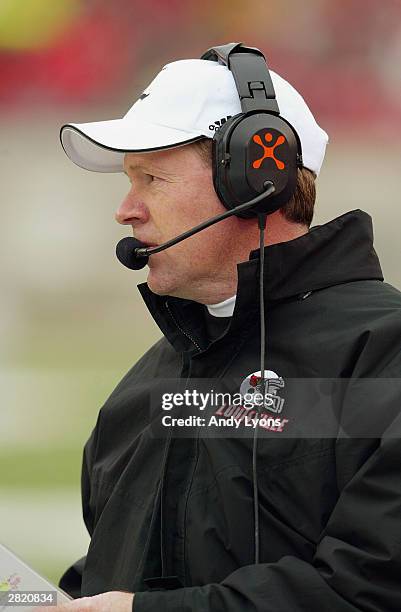 Head coach Bobby Petrino of the Louisville Cardinals watches from the sideline during the game against the Memphis Tigers on November15, 2003 at Papa...