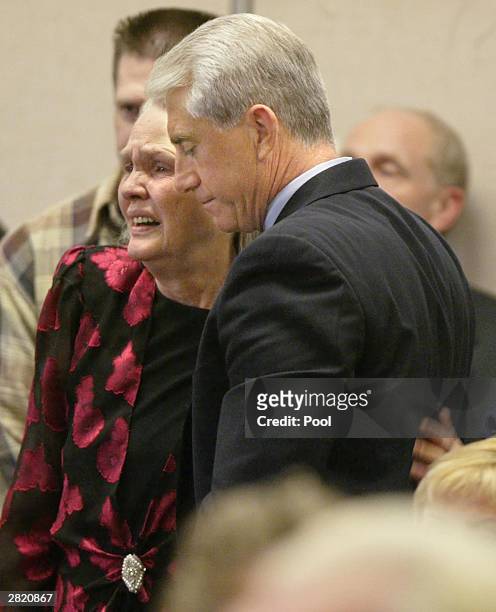 Joan Mackie mother of Green River Killer victim Cindy Smith gets a hug from King County Sheriff Dave Reichert at the sentencing of Gary Ridgway in...