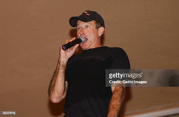 Actor/comedian Robin Williams entertains the troops during the United Service Organizations tour at Kirkuk Air Base on December 17, 2003.