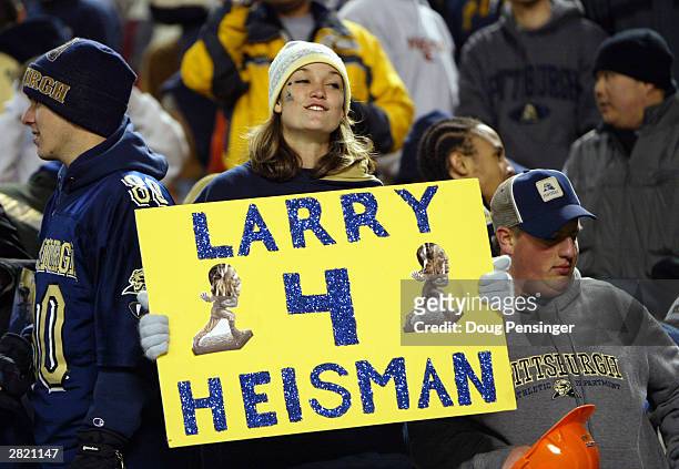 Pittsburgh Panthers fan shows her support for sophomore wide receiver Larry Fitzgerald and his run at the Heisman Trophy during the game against the...