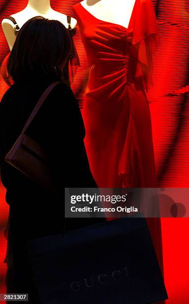 Italian shoppers browse for Christmas gifts at Via Condotti, which is the home to some of the world's most famous designer boutiques including...