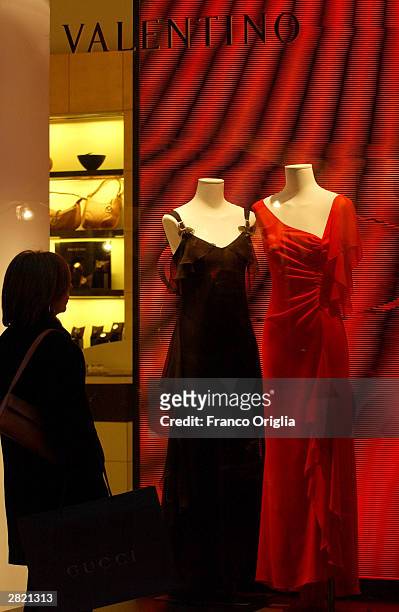 Italian shoppers browse for Christmas gifts at Via Condotti, which is the home to some of the world's most famous designer boutiques including...