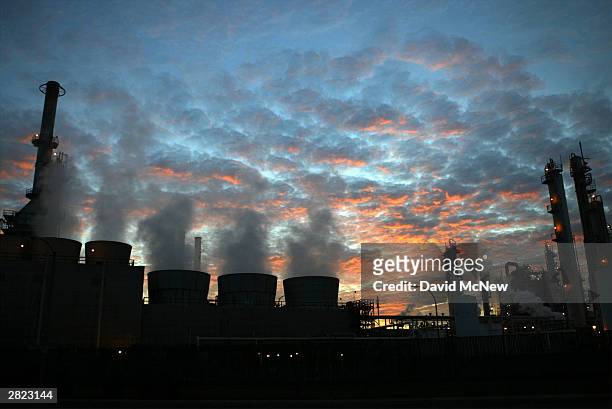 The Wilmington ARCO refinery is seen before dawn on December 19, 2003 in Los Angeles, California. Crude oil prices have reached the highest level...