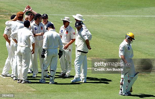Scott Meuleman of the Warriors walks off dejected after being dismissed for LBW of the bowling of Andrew McDonald of the Bushrangers during the Pura...