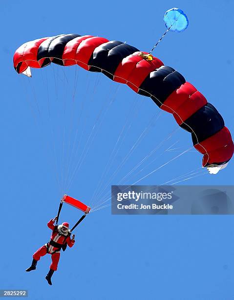 Santa Claus is spotted flying into the WACA on Family day during day two of the Pura Cup match between Western Warriors and Victorian Bushrangers at...