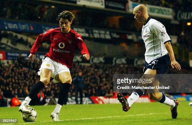 Cristiano Ronaldo of Manchester United tussles with Paul Konchesky of Tottenham during the FA Barclaycard Premiership match between Tottenham Hotspur...