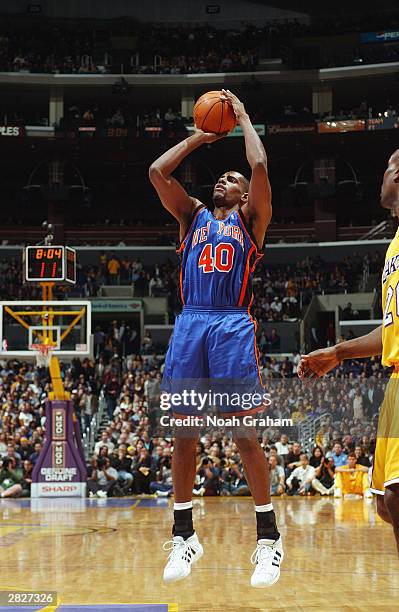 Kurt Thomas of the New York Knicks shoots a jumper during the game against the Los Angeles Lakers at Staples Center on December 9, 2003 in Los...