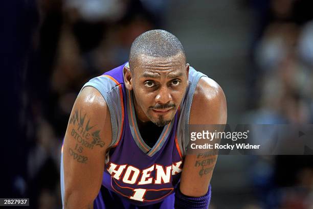 Anfernee Hardaway of the Phoenix Suns looks on during the NBA game against the Sacramento Kings at Arco Arena on December 14, 2003 in Sacramento,...
