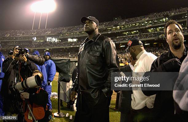 Shaquille O'Neal of the Los Angeles Lakers watches the Monday Night football game between the Green Bay Packers and the Oakland Raiders as part of 'A...