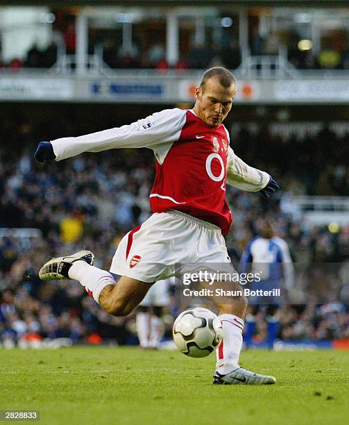 Freddie Ljungberg of Arsenal strikes the ball during the FA Barclaycard Premiership match between Arsenal and Blackburn Rovers on December 14, 2003...