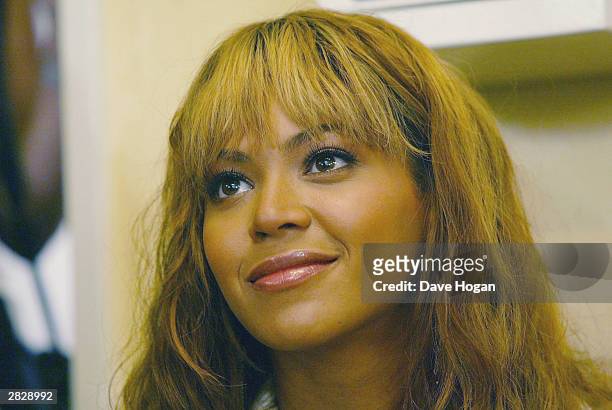 Singer Beyonce Knowles visits the Indawo Yokobelekisa Mothers 2 Mothers centre for young single mothers who have the opportunity to help each other...