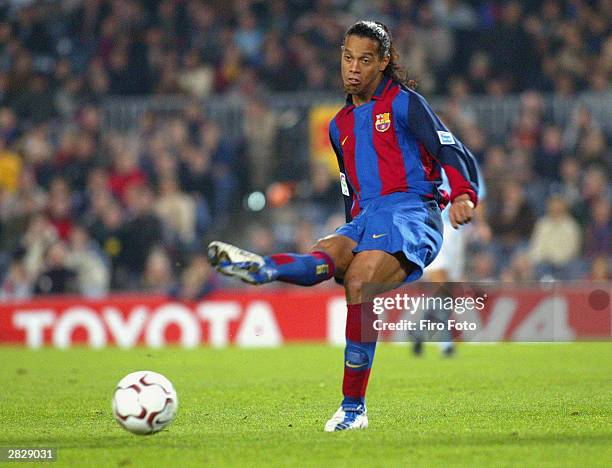 Ronaldinho of Barcalona passes the ball during the Spanish Premier League match between Barcelona and Celta Vigo December 20, 2003 at the Camp Nou...