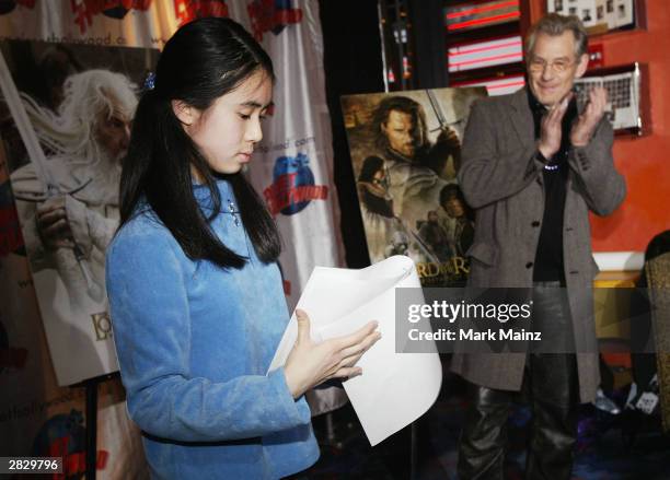 New York Essay Grand Prizewinner Vivian Truong reads her essay to actor Ian McKellen at a private screening of "The Lord of the Rings: The Return of...